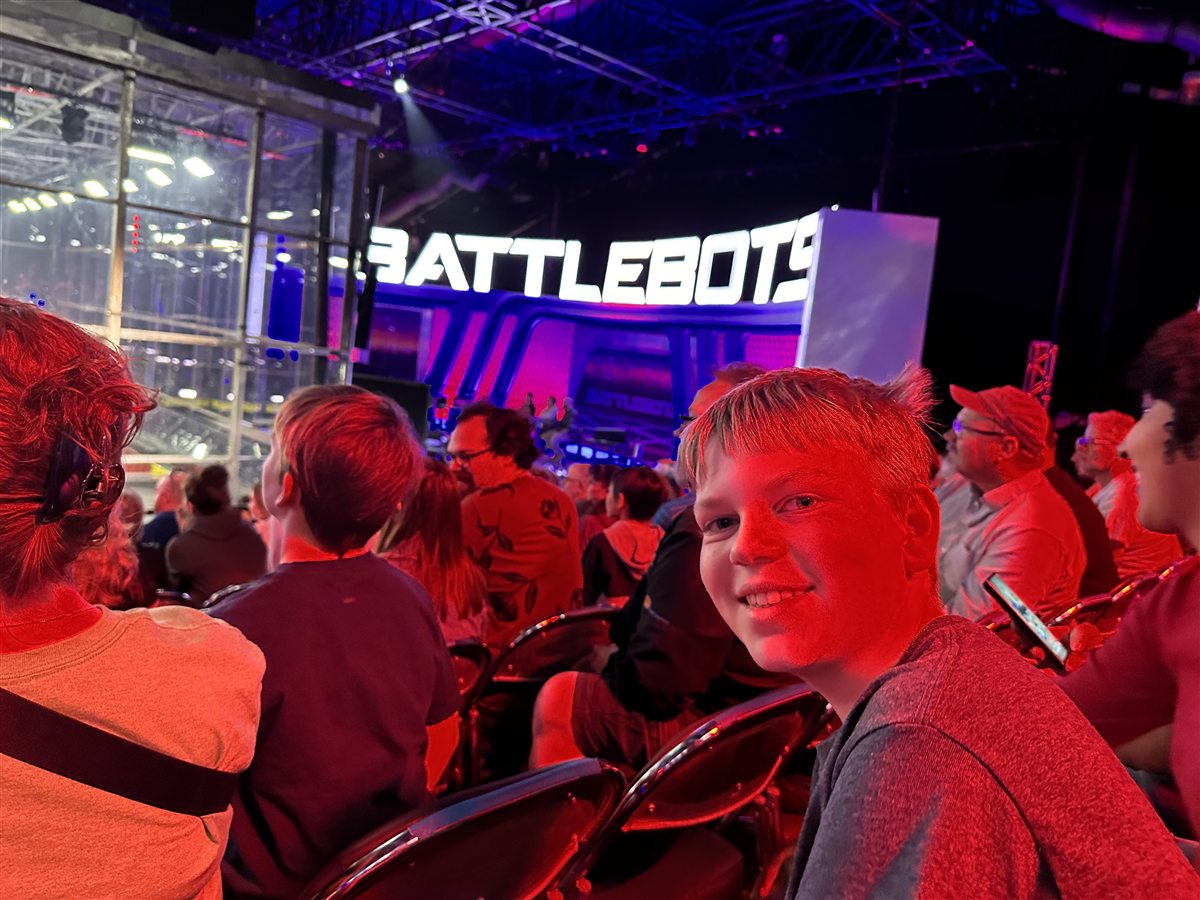 Cooper watching a live BattleBots match in Las Vegas